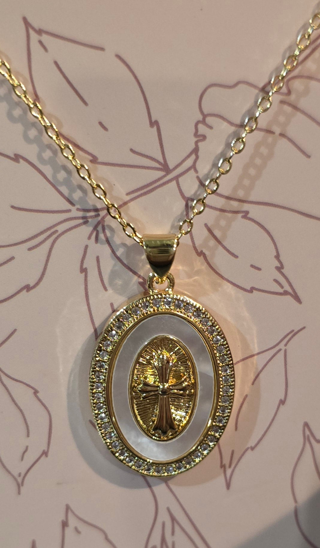 18k gold plated oval Mother of pearl pendant with pave cross