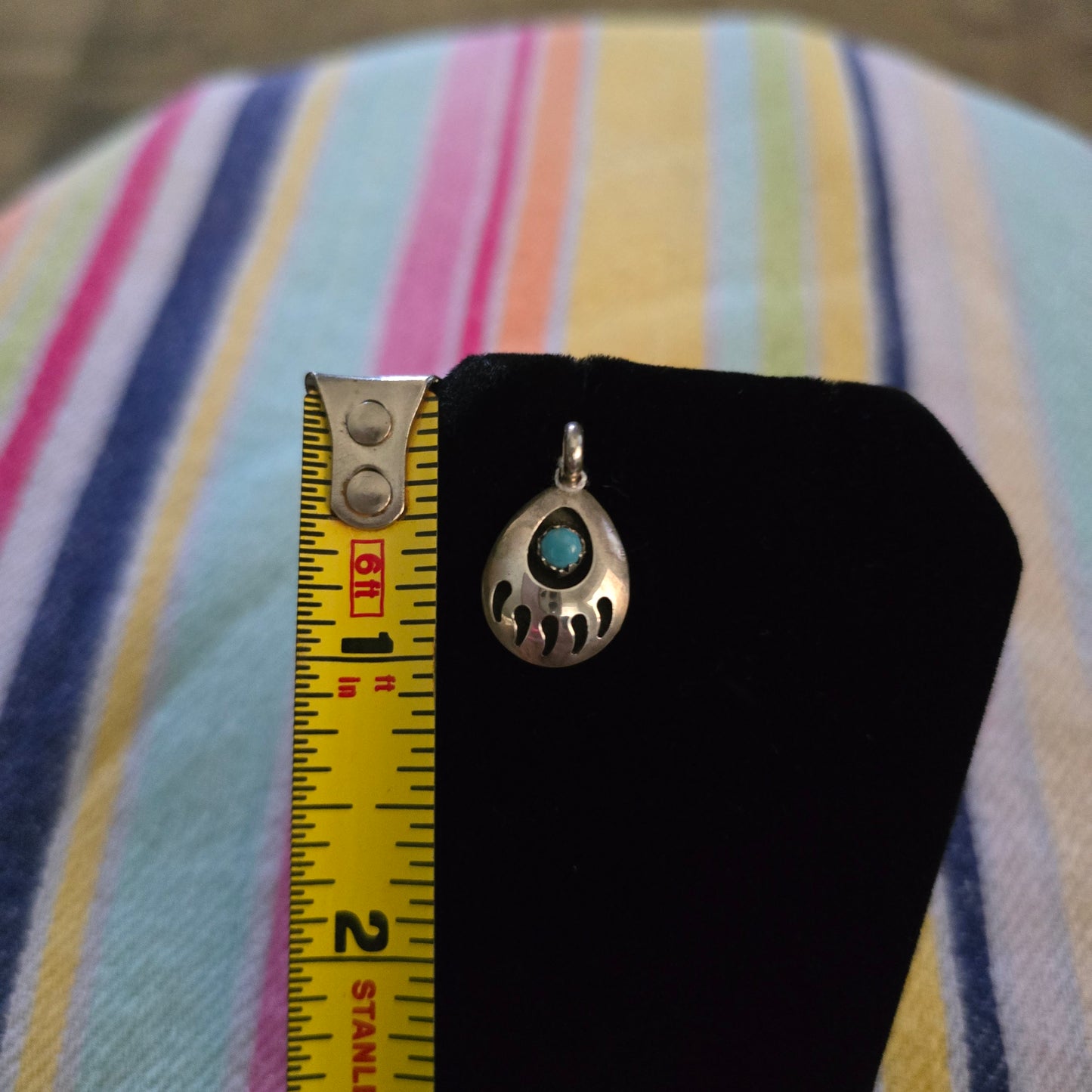 Sterling silver bear paw turquoise pendant