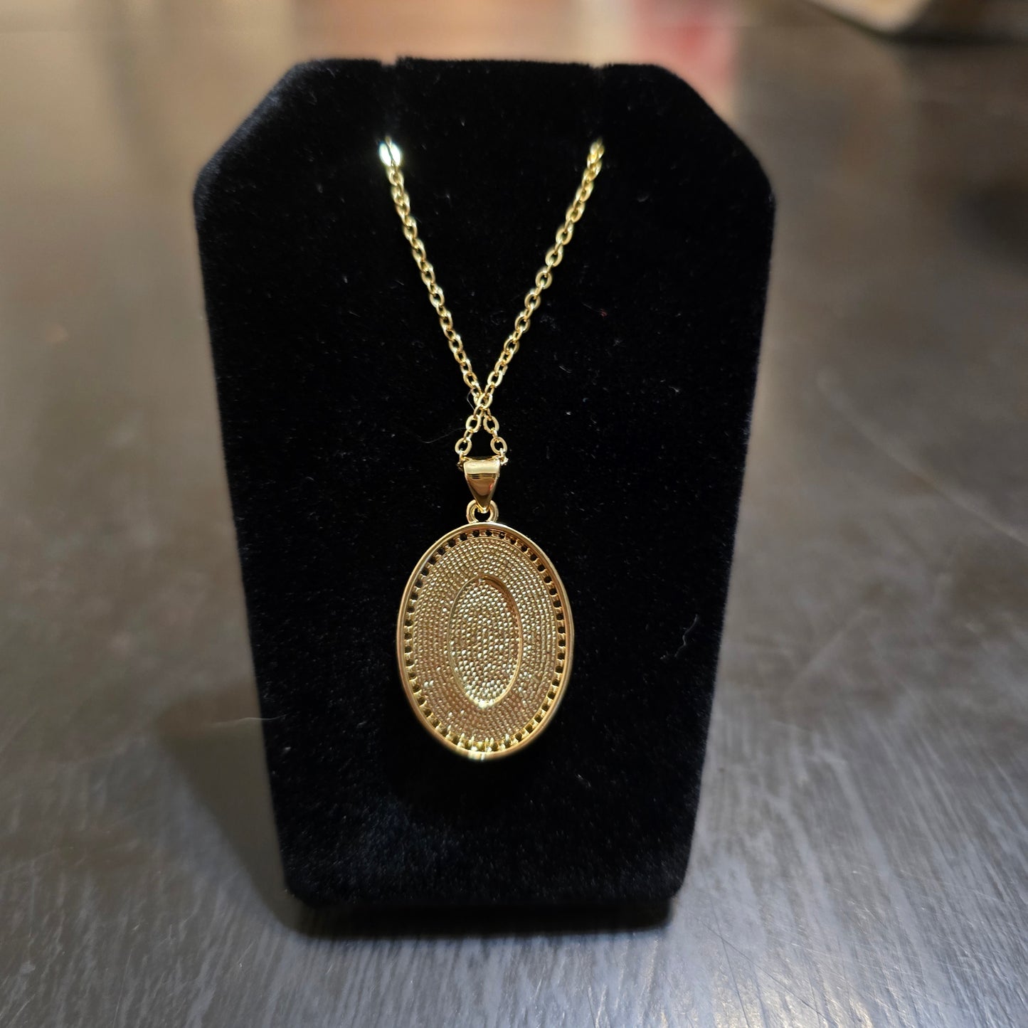 18k gold plated oval Mother of pearl pendant with pave cross