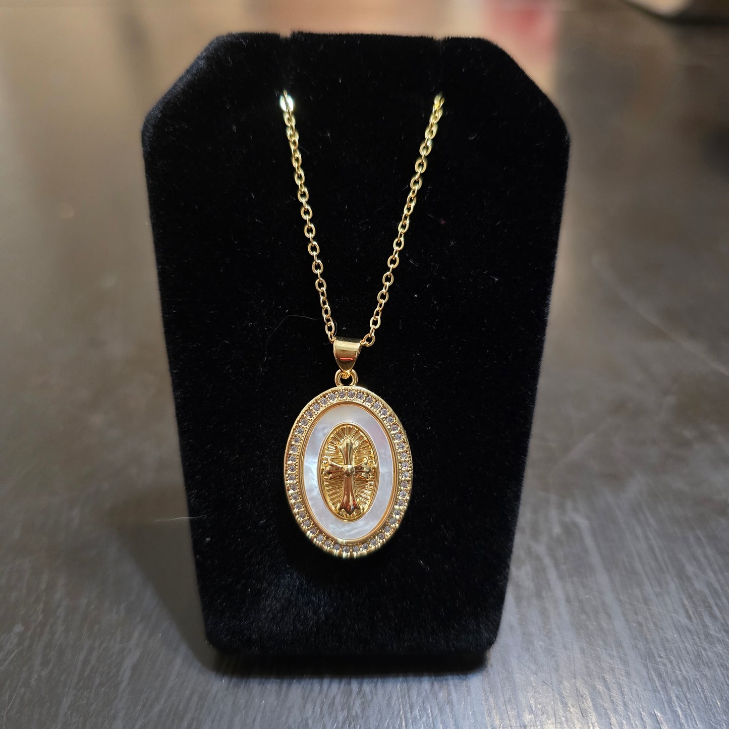 18k gold plated oval Mother of pearl pendant with pave cross